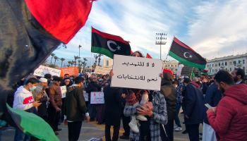 تظاهرة في طرابلس تطالب بإجراء الانتخابات، فبراير 2022 (فرانس برس)