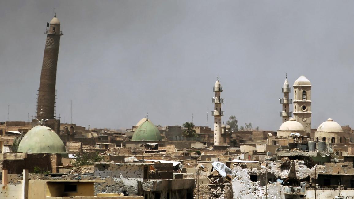 مئذنة رائدة ومسجد نوري بمدينة الموصل القديمة(أحمد الربيعي/فرانس برس)