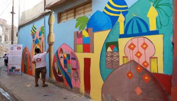 فريق "ثورة الفن" يعيدون الحياة لجدران الموصل المتهالكة