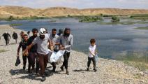 الدفاع المدني السوري ينتشل جثة غريق من نهر الفرات (فيسبوك)