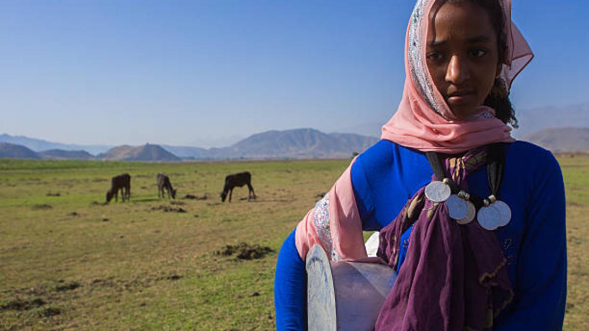 	ARTUMA, ETHIOPIA - FEBRUARY 21: Portrait of an oromo girl with maria theresa thalers necklace, amhara region, artuma, Ethiopia on February 21, 2016 in Artuma, Ethiopia. (Photo by Eric Lafforgue/Art in All of Us/Corbis via Getty Images)