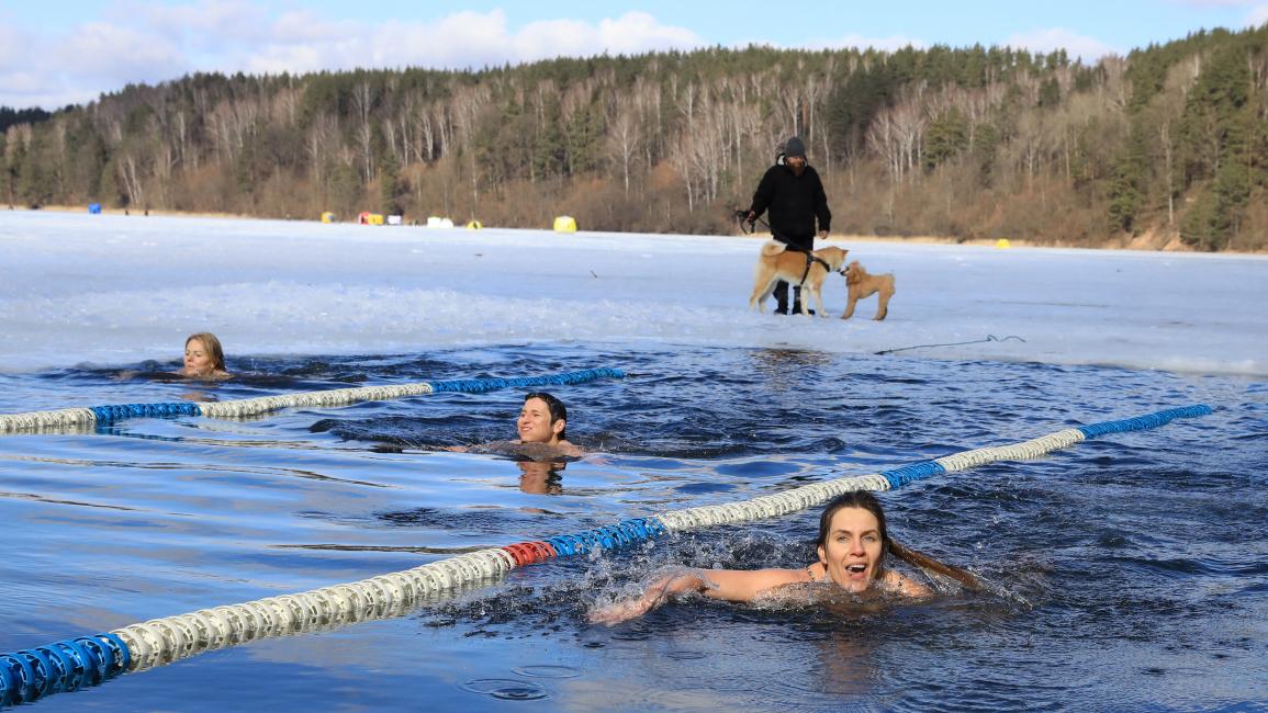 سباق سباحة في ليتوانيا (بتراس مالوكاس/ فرانس برس)