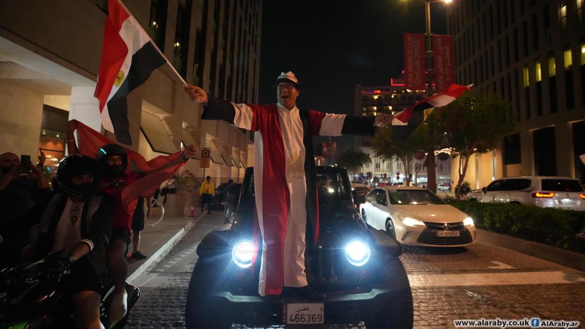 الجمهور المغربي يحتفل في شوارع الدوحة