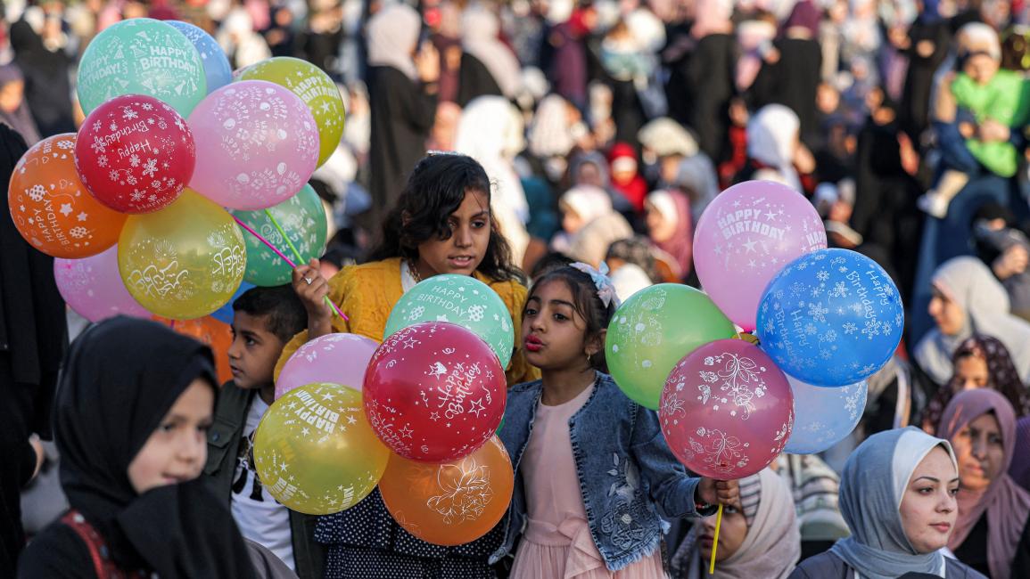 بالونات العيد الملونة في غزة (محمد حمص/فرانس برس)
