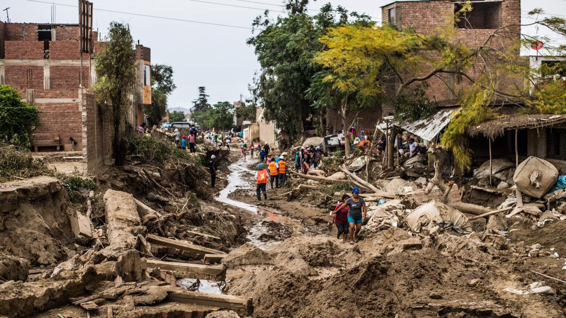 دمار هائل خلفته الفيضانات في البيرو (إرنستو بينافيديس/فرانس برس)