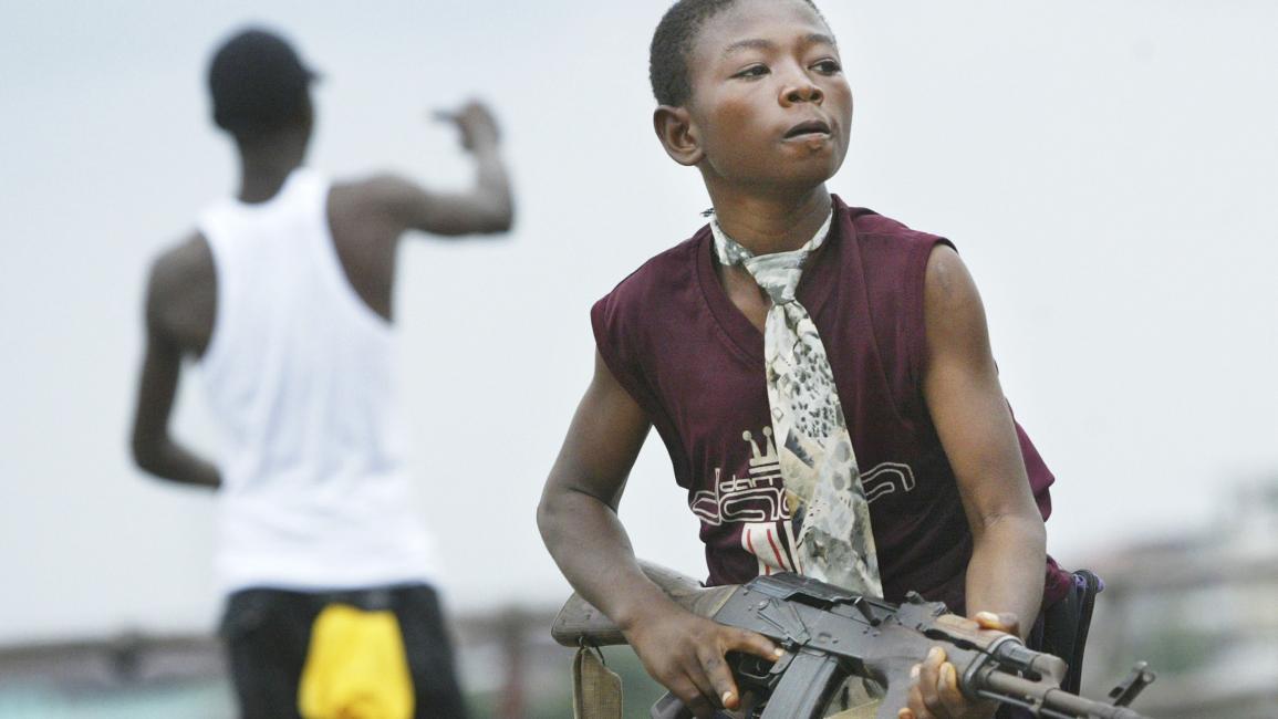 شارك الأطفال في القتال في ليبيريا (كريس هوندوروس/Getty)