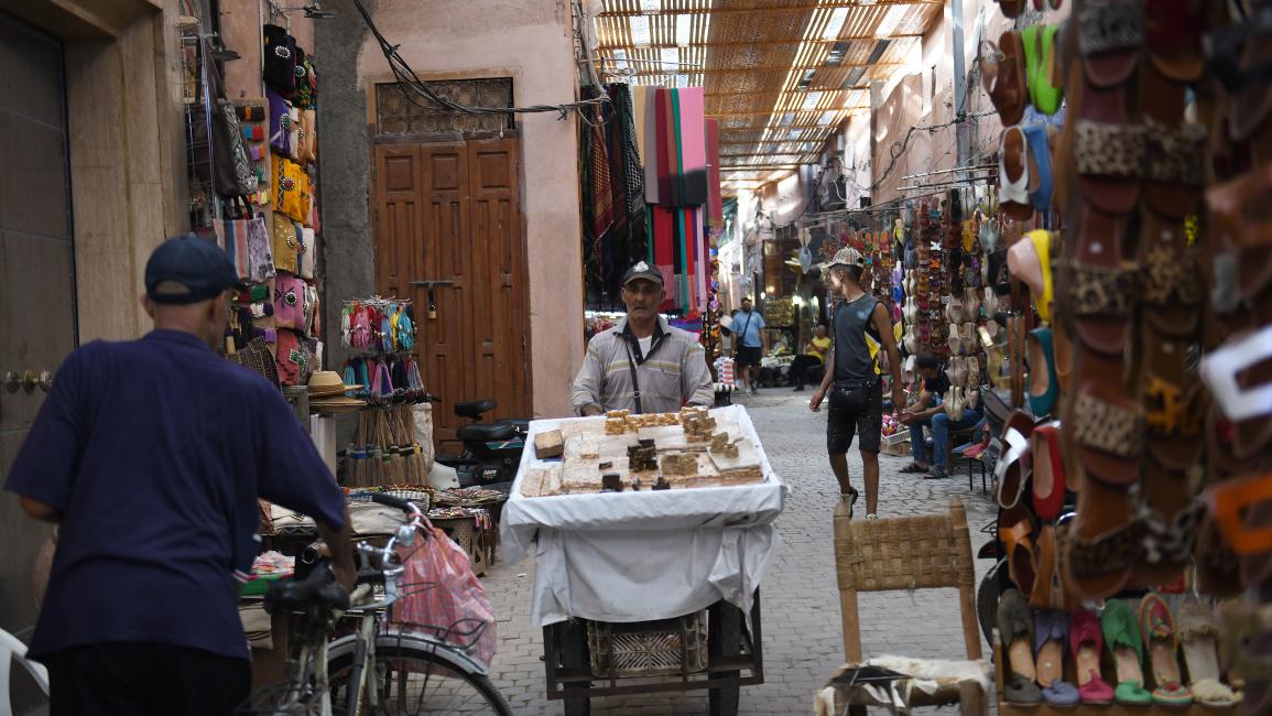 بائع متجول في سوق مراكش (فرناندو سانشيز/Getty)