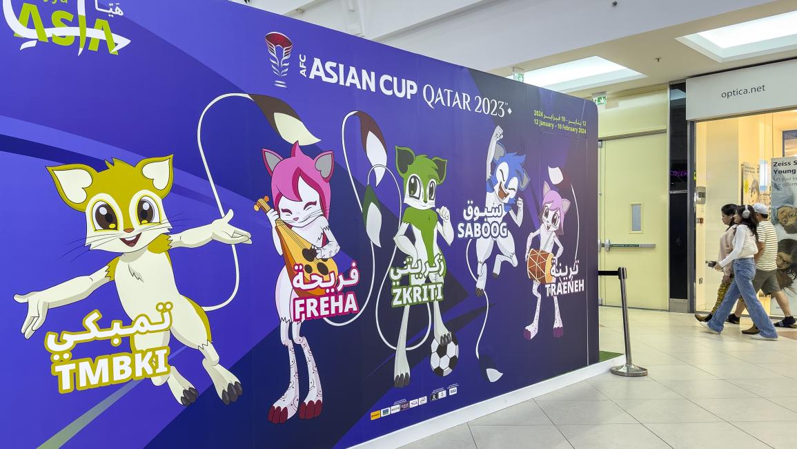 شعارات خاصة ببطولة كأس آسيا في كل أرجاء الدوحة (نُشاد تيكاييل/ Getty) 