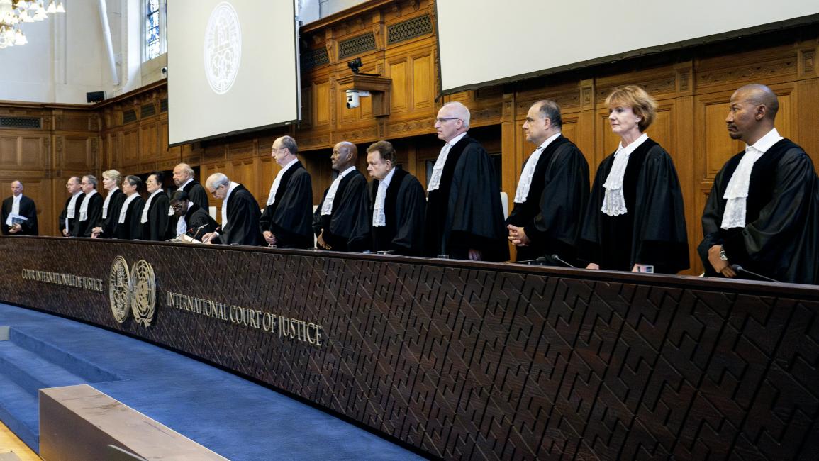 قضاة "العدل الدولية" الـ15 يقفون قبل إصدار الحكم بشأن العواقب القانونية للاحتلال الإسرائيلي ( 19/7/2024فرانس برس)