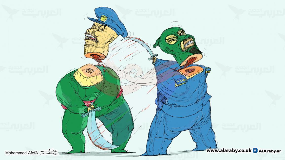 كاريكاتير الانظمة والارهاب / ابو عفيفة