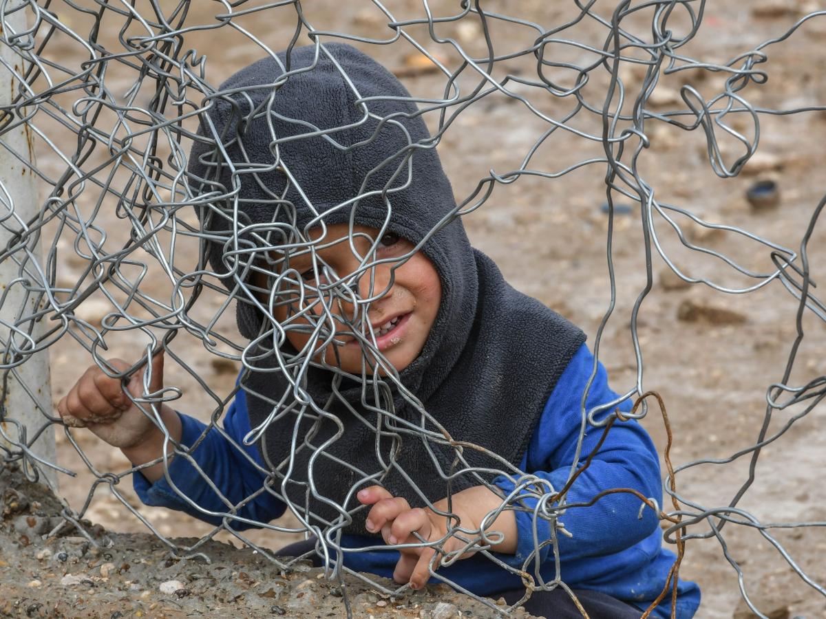 أكثر من ألفي طفل بلا قيد في مخيم الهول (جيوسيبي كاكاسي/ فرانس برس)