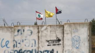 أعلام فلسطين ولبنان وحزب الله على حدود لبنان 3 يوليو 2024 (Getty)