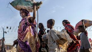 لاجئون سودانيون فروا من الحرب بين الجيش وقوات الدعم السريع، 14 فبراير2024(لويس تاتو/Getty)