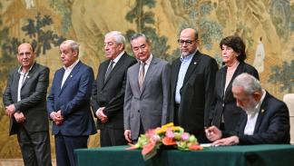 اتفاق المصالحة الفلسطينية/من توقيع الاتفاق في بكين، 23 يوليو 2024 (فرانس برس)