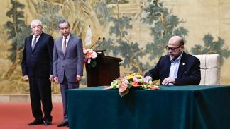 خلال التوقيع على اتفاق المصالحة، بكين، 23 يوليو 2024 (Getty)
