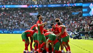 فرحة لاعبي المغرب بالهدف الثالث أمام أميركا، 2 أغسطس 2024 (بول إيليز/فرانس برس)