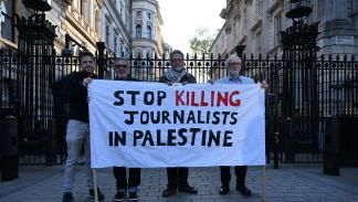 "توقفوا عن قتل الصحافيين في فلسطين"، لندن، 19 مايو 2024 (الأناضول)