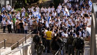 مستوطنون يقتحمون المسجد الأقصى خلال مسيرة الأعلام، 5 يونيو 2024 (فايز أبو رميلة/فرانس برس)