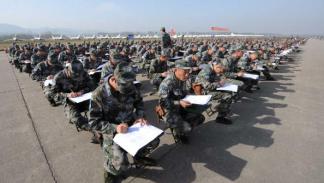 جنود صينيون يشاركون في أحد الاختبارات التدريبية، 22 أكتوبر 2022 (فرانس برس)