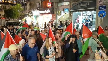 مسيرة في رام الله تنديداً بمجزرة مخيم النصيرات، 8 يونيو 2024 (العربي الجديد)