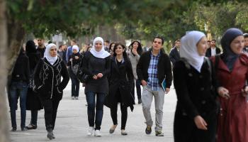 طلاب سوريون في جامعة دمشق، 23 فبراير 2012 (Getty)