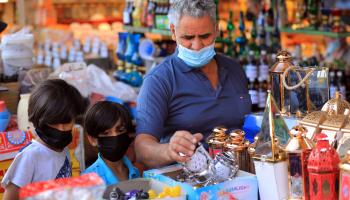 شراء مستلزمات شهر رمضان مهم لعادات وتقاليد العراقيين (مرتضى سوداني/ الأناضول)