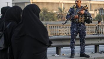 النساء والأطفال أكثر عرضة للاتجار بالبشر في العراق (أحمد الربيعي/فرانس برس)