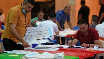 الأحزاب العراقية/من فرز الأصوات إثر الانتخابات التشريعية، 13 أكتوبر 2021 (أحمد الربيعي/فرانس برس)