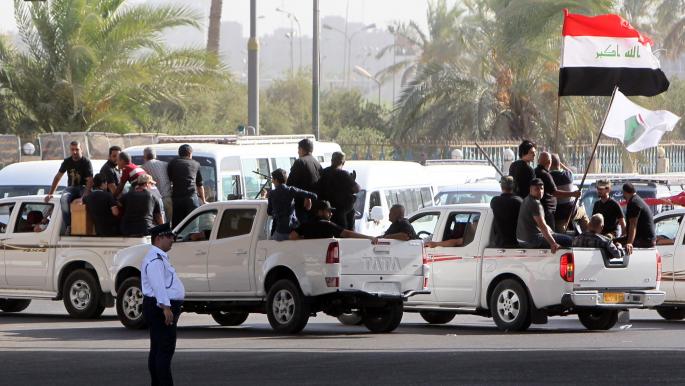 مداهمات ليلية لمنازل ناشطين في النجف واتهامات تلاحق أتباع الصدر