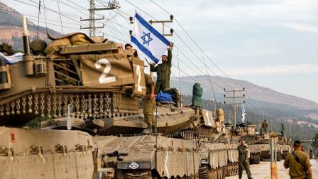 جنود إسرائيليون خلال المعارك مع حزب الله قرب حدود لبنان، 11 أكتوبر 2023 (Getty)