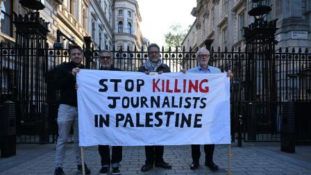 "توقفوا عن قتل الصحافيين في فلسطين"، لندن، 19 مايو 2024 (الأناضول)