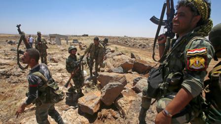 عناصر من قوات النظام السوري في درعا 29 يونيو 2018 (يوسف كرواشان/فرانس برس)